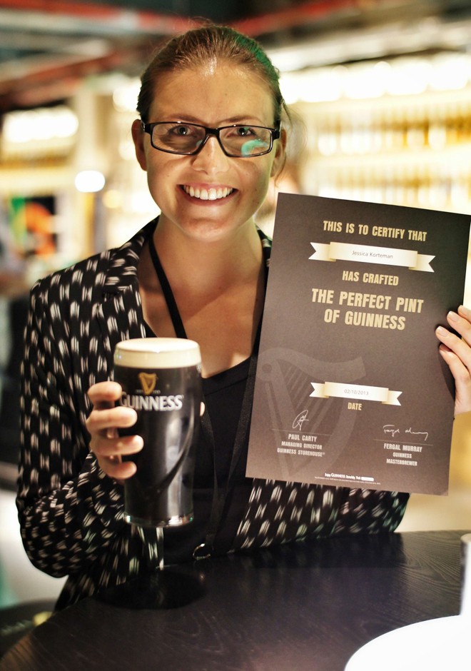 Pouring perfect pint, Guinness Storehouse, Dublin, Ireland
