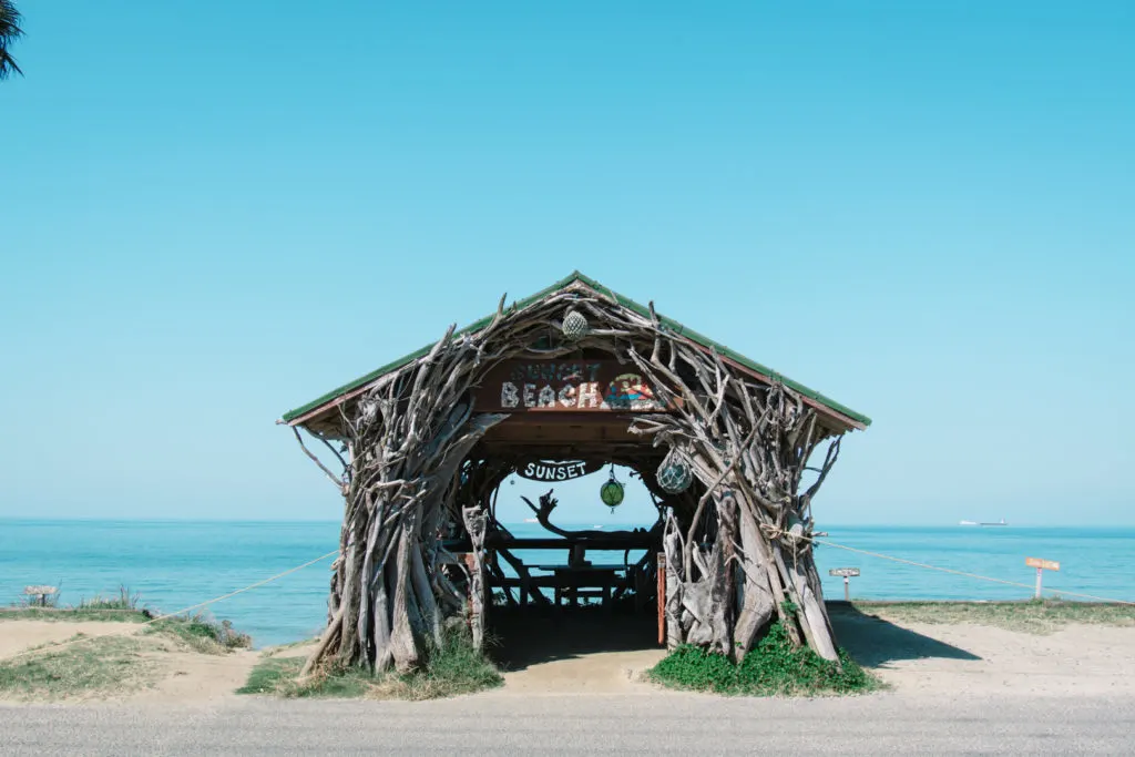 Wooden sunset beach shack along the coast of Itoshima.