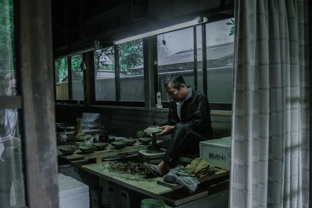 Artisan at work at Takatoriyaki Souke pottery.